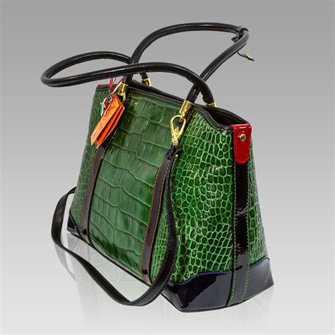 emerald green designer handbags.